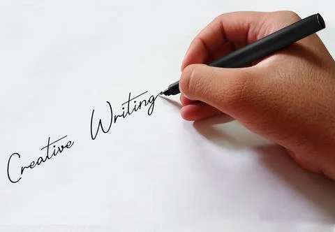 Creative Writing Background with Hand is writing with pen on the paper Stock Photos