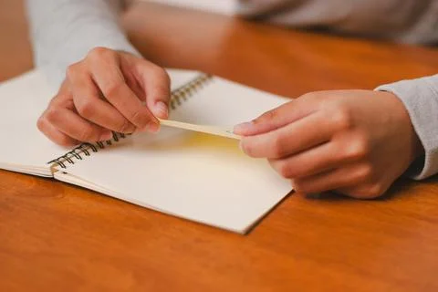 Creative writing session hands holding paper note cozy desk environment per.. Foto stock