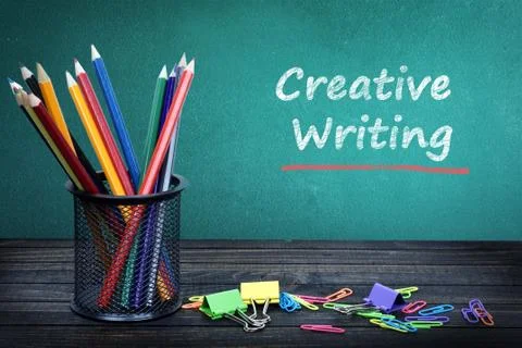 Creative writing text on green board Stock Photos