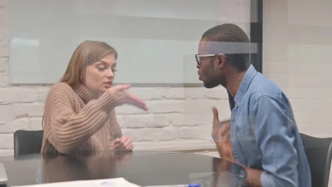 Creative Young Colleagues Doing Argument in Office Stock Footage 302874555