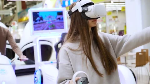 A creative young girl is playing an augmented reality VR game Stock-Footage 234483505