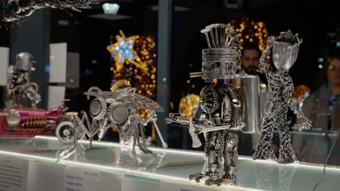 Creatively crafted metal characters showcase in art exhibition Stock Footage 315226605