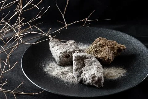 A creatively designed dessert featuring chocolate in a unique artistic presen Stock Photos