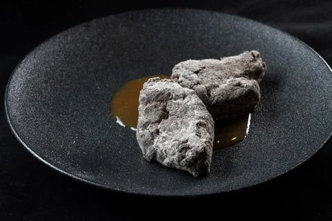 A creatively designed dessert featuring chocolate in a unique artistic presen 스톡 사진