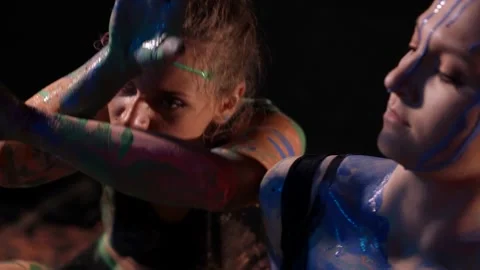 Creativity and art dance performance, women are dancing, smearing paints over Video stock 169237456