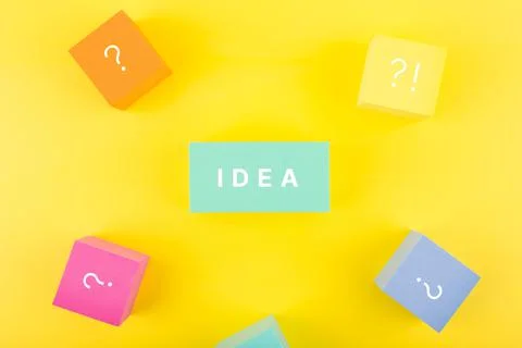 Creativity and idea concept. Single word idea written on blue rectangle Stock Photos