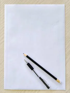 Creativity and planning concept: blank sheet, pen and pencil Stock Photos