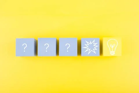 Creativity, brainstorming and fresh ideas concept. Light bulb and question signs Stock Photos