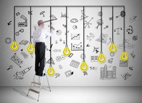 Creativity concept drawn by a man on a ladder Foto stock