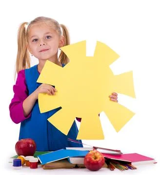 Creativity concept. hild and creativity. girl cuts the sun out of colored p.. Stock Photos