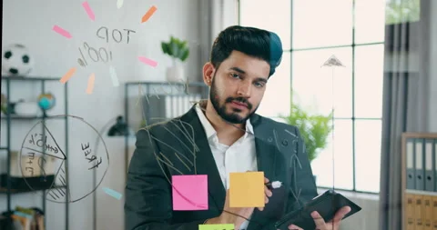 Creativity concept where good-looking inventive purposeful bearded guy Stock Footage 157935551