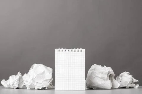 Creativity creative process. crumpled wads and notebook on gray Copyright:... 스톡 사진