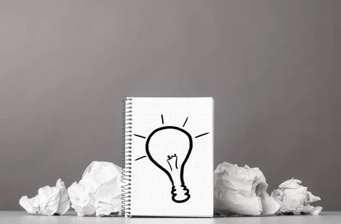 Creativity creative process. crumpled wads and notebook with bulb picture ... 写真素材