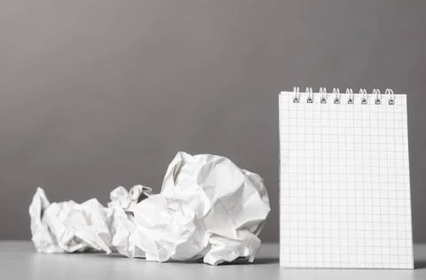 Creativity creative process. crumpled wads and notebook on gray Copyright:... 스톡 사진