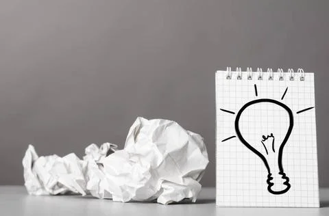 Creativity creative process. crumpled wads and notebook with bulb picture ... 写真素材