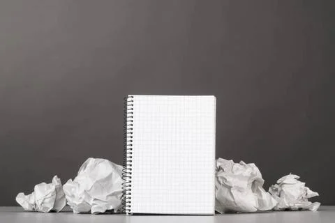 Creativity creative process. crumpled wads and notebook on gray Copyright:... 写真素材