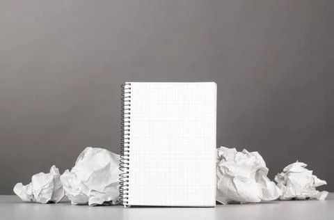 Creativity creative process. crumpled wads and notebook on gray Copyright:... 스톡 사진