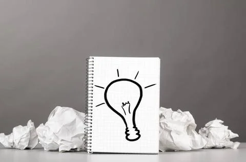 Creativity creative process. crumpled wads and notebook with bulb picture ... 스톡 사진