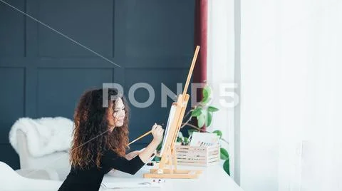 Creativity inspiration talented lady painting home Stock Photos
