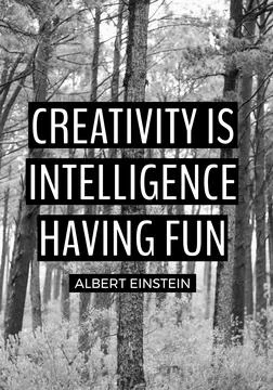 Creativity is intelligence having fun quote by albert einstein over forest Stock Photos
