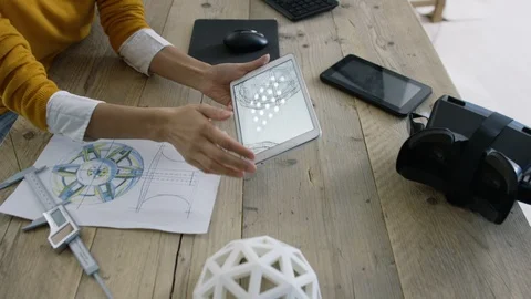 Creativity team discussing over 3D model at modern office Stock-Footage 106778110