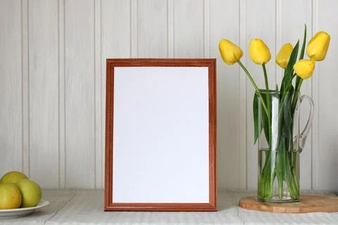 The creator of the cottage core scene, spring mockup.  an empty wooden frame. Stock-Fotos