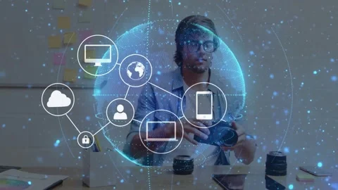 Creator at desk checking DSLR causing tech globe pulsing icons linking tapping Stock Footage 331084699