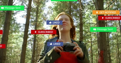 Creator looking up in pines sub popping social tags swarming face settling near Stock Footage 330621348
