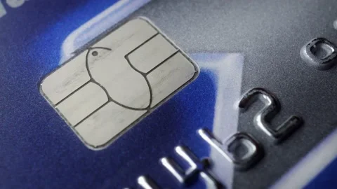 Credit card chip and pin rotating extreme close up stock footage Stock Footage