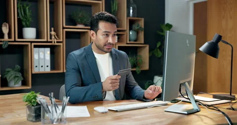 Credit card, computer and man in office for payment, financial investment and Stock Footage 342330691