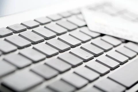 Credit card on a computer keyboard Stock Photos