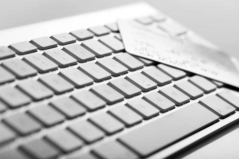 Credit card on a computer keyboard Stock Photos