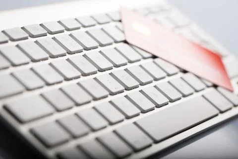 Credit card on a computer keyboard Stock Photos
