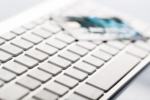 Credit card on a computer keyboard Stock Photos