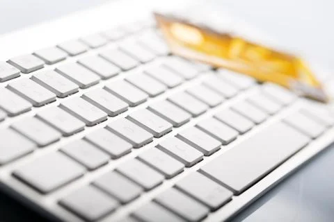 Credit card on a computer keyboard Stock Photos