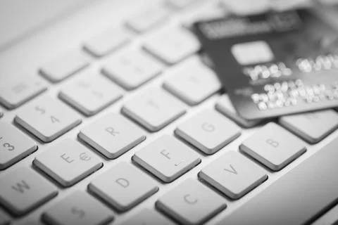 Credit card on a computer keyboard Stock Photos