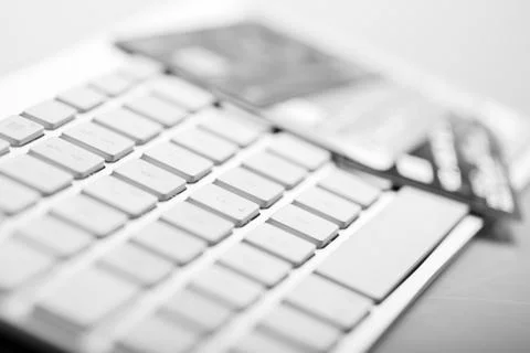 Credit card on a computer keyboard Stock Photos