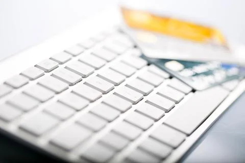 Credit card on a computer keyboard Stock Photos