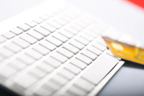 Credit card on a computer keyboard Stock Photos