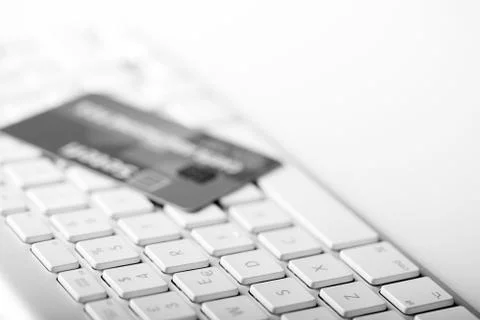 Credit card on a computer keyboard Stock Photos