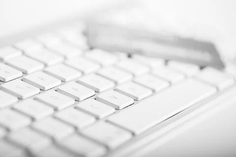 Credit card on a computer keyboard Stock Photos