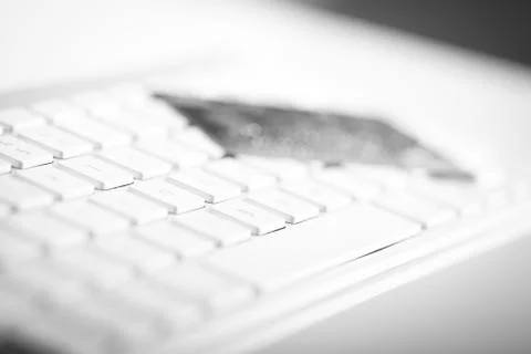 Credit card on a computer keyboard Stock Photos