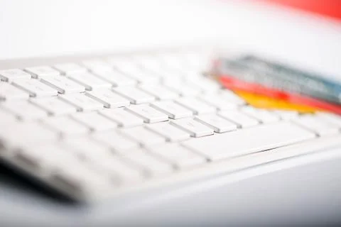 Credit card on a computer keyboard Stock Photos