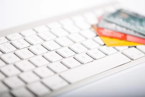Credit card on a computer keyboard Stock Photos