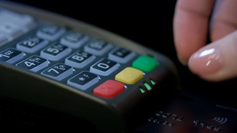 Credit card machine for money transaction. Woman hand with credit card Stock Footage
