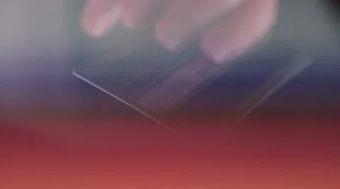 Credit card in reflection on the touchscreen of a tablet computer while shopping Video stock 55395628