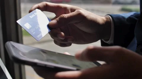 Credit card using instant mobile payments at home laptop or couple with credi Stock Footage 265931976
