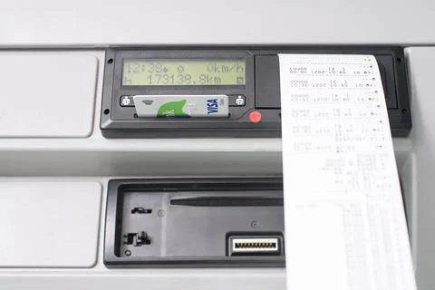 Credit debit card inserted in a digital tachograph instead of a driver digita Stock Photos