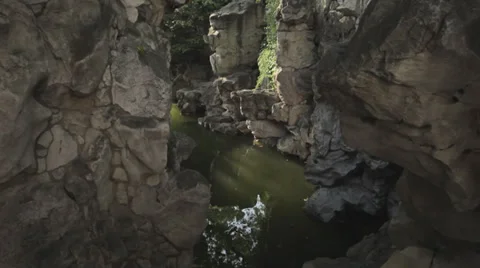 Creek among towering cliffs Stock Footage 37100405