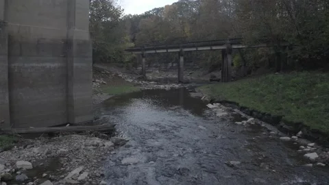 Creek flyover under bridge Stock Footage 165057342